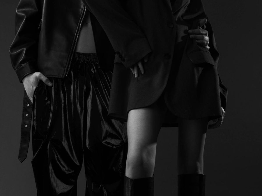 Two fashion models in black leather looks