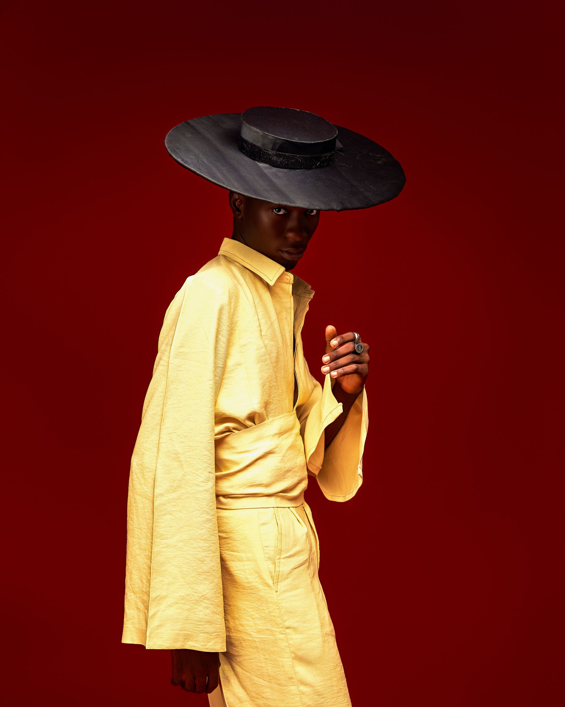 Fashion model in a yellow suit