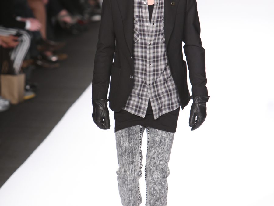 Model Felix Bujold walking the William Rast runway at New York Fashion Week in 2009